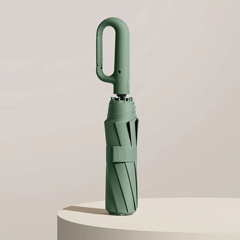 "Unisex compact umbrella with UV protection, featuring a reinforced frame, sleek design, and ergonomic handle in various colo