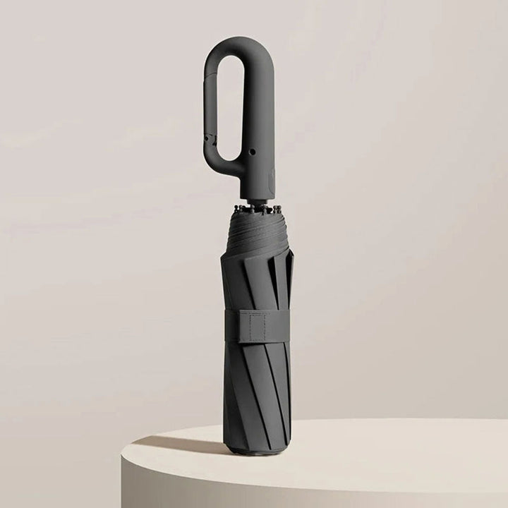 "Unisex compact umbrella with UV protection, featuring a reinforced frame, sleek design, and ergonomic handle in various colo
