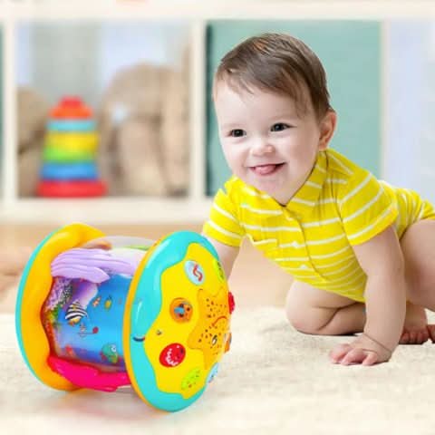 Infant & toddler light-up musical toy drum for early development and sensory stimulation.