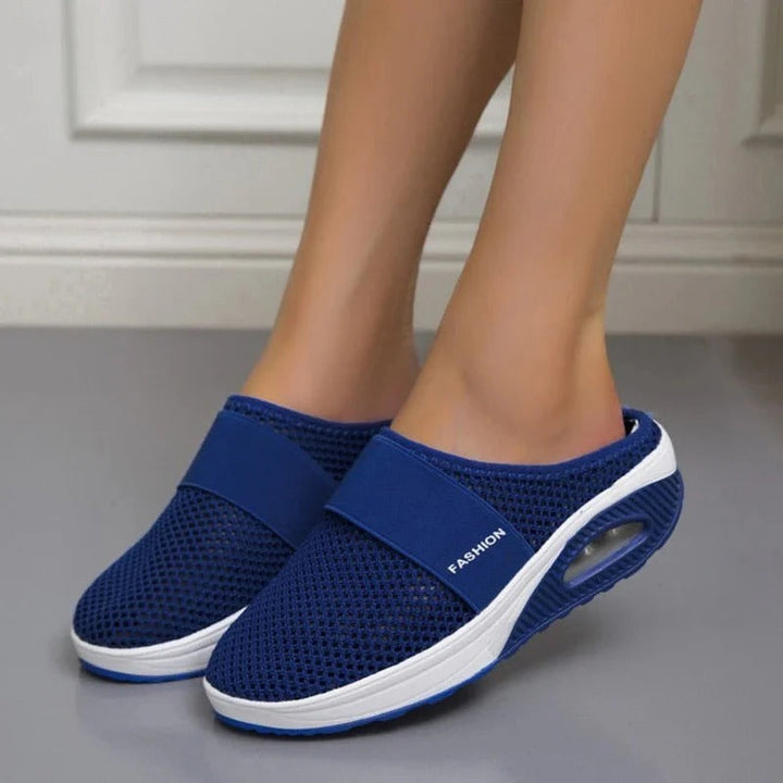 Slip-on everyday comfort slippers for unisex all-day support. Lightweight, breathable foot support for everyday wear.