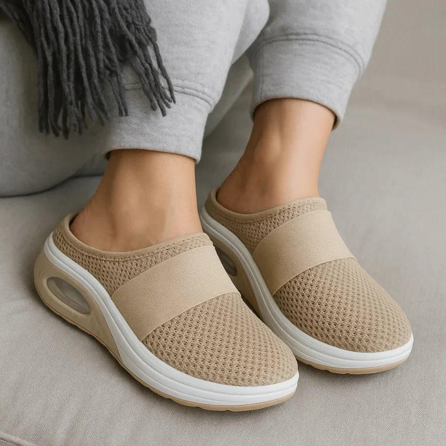 Lightweight, breathable unisex comfort slippers. Provides all-day orthopedic foot support for comfortable everyday wear.
