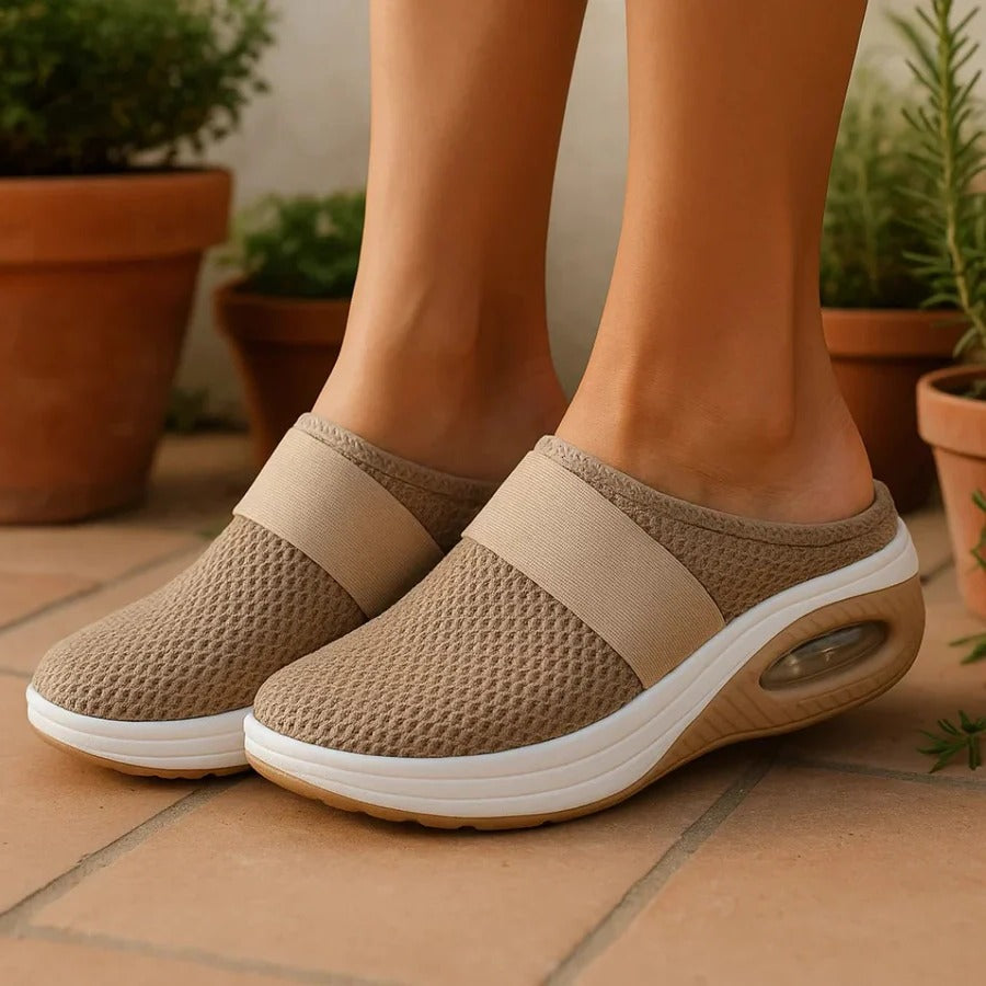 Breathable unisex comfort slippers. Provides lightweight, orthopedic all-day foot support for ultimate comfort.