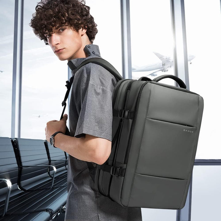 Adventure ready, 26-45L expandable travel backpack, waterproof with laptop pouch.