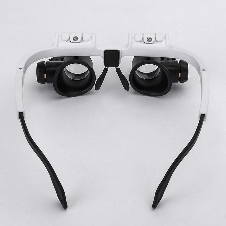 Adjustable headband LED magnifying glasses for hands-free precision crafting, hobbies, and detailed work.