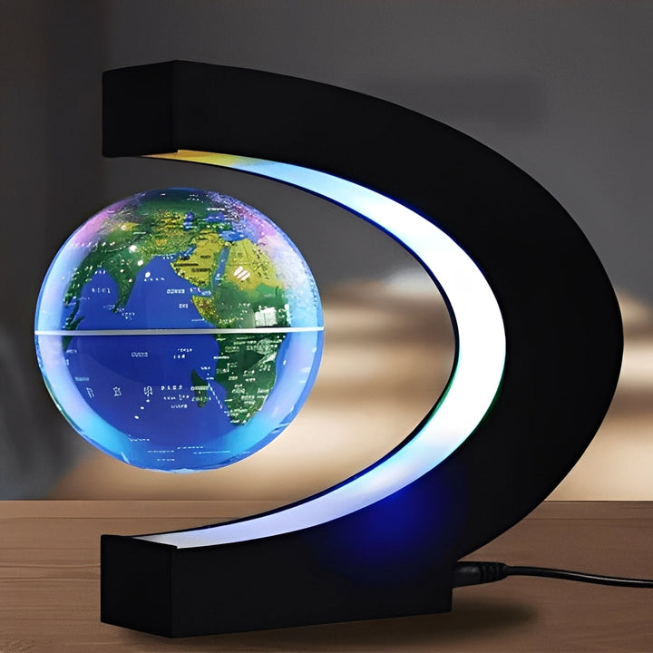 Unisex levitating globe with LED light, a magnetic desk ornament. Modern floating world map for office decor & unique gift.