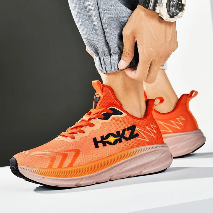 Sleek unisex running shoes, lightweight design for optimal performance & training. Comfortable sports footwear.