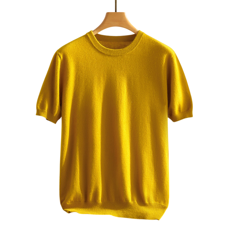 Model wearing a relaxed fit unisex cashmere crewneck tee, demonstrating comfort and versatile, breathable style.