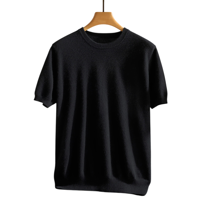 Neatly folded luxury cashmere crewneck tee, emphasizing its premium feel and high-quality material.