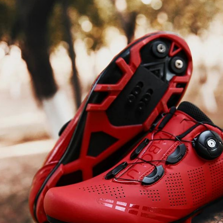 Durable unisex cycling footwear with orthopedic support, enhancing comfort & power for serious road cyclists.