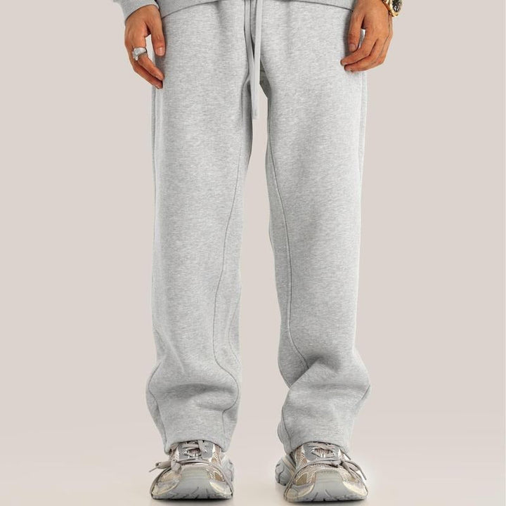 Unisex premium relaxed fit fleece sweatpants in a neutral tone, perfect for loungewear and casual wear