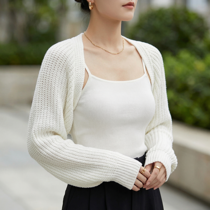 Unisex ribbed knit shrug, a lightweight & versatile layering top. Perfect for adding comfort and style.