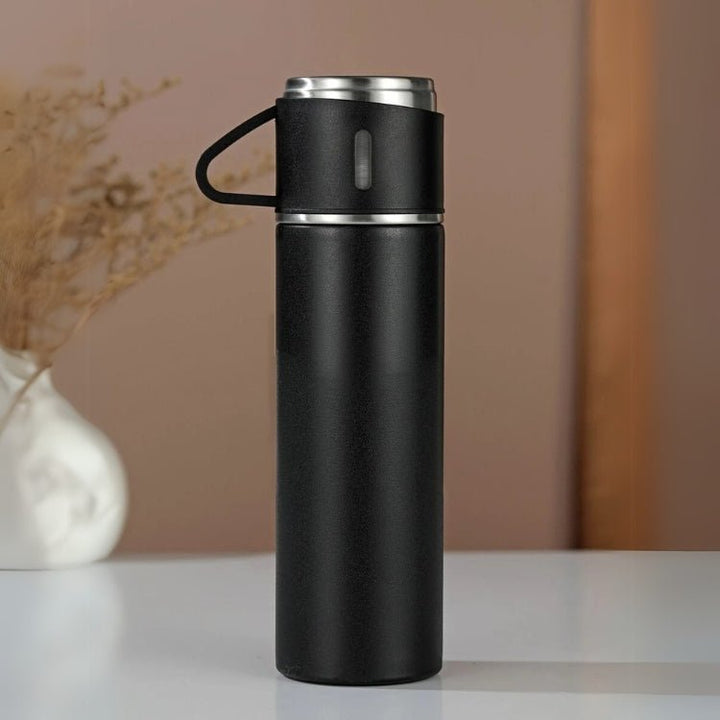 Unisex stainless steel insulated water bottle for hot & cold drinks. Reusable, leakproof hydration.