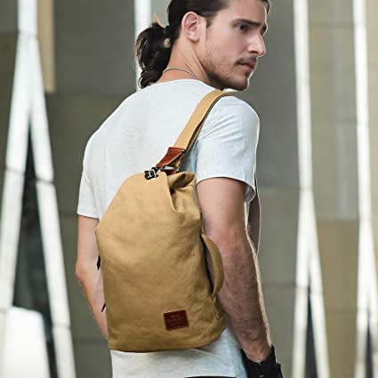 Unisex water-resistant canvas crossbody bag, perfect for daily use & travel.