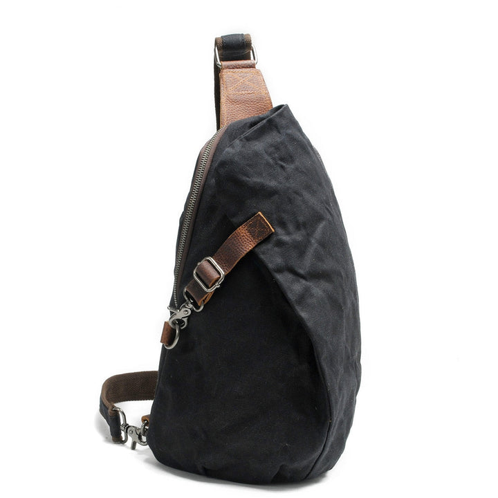 Organizational interior of a durable water-resistant travel shoulder bag.