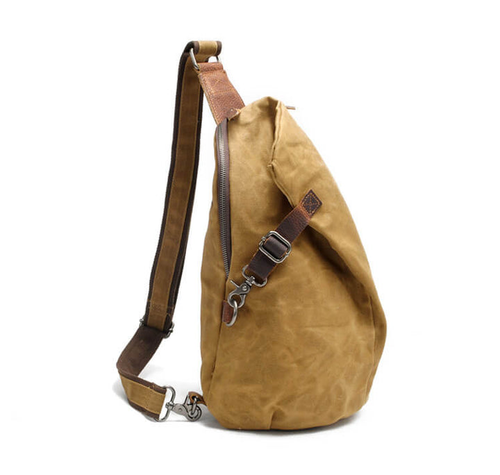 Unisex canvas sling bag, practical & durable for everyday urban adventures.