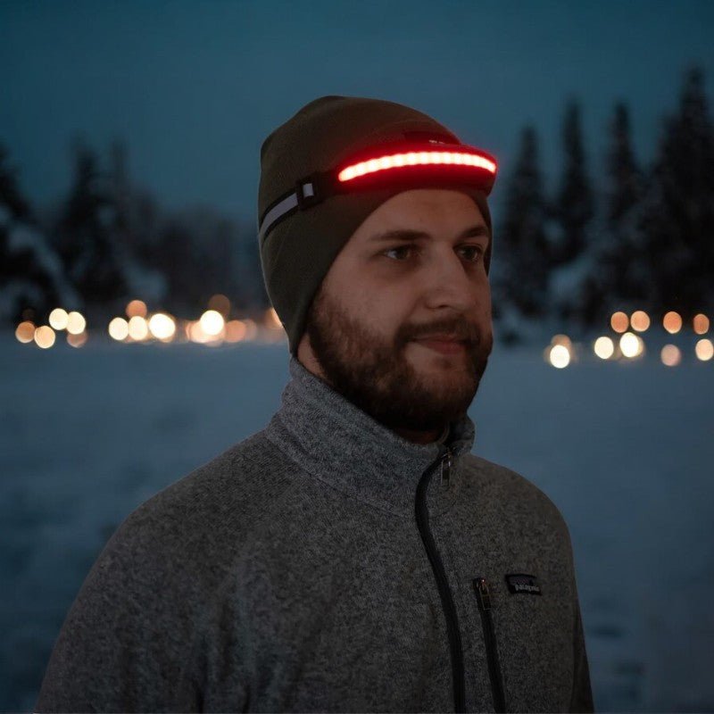 Unisex wide-angle headlamp for outdoor adventures, providing bright illumination for hiking & camping.
