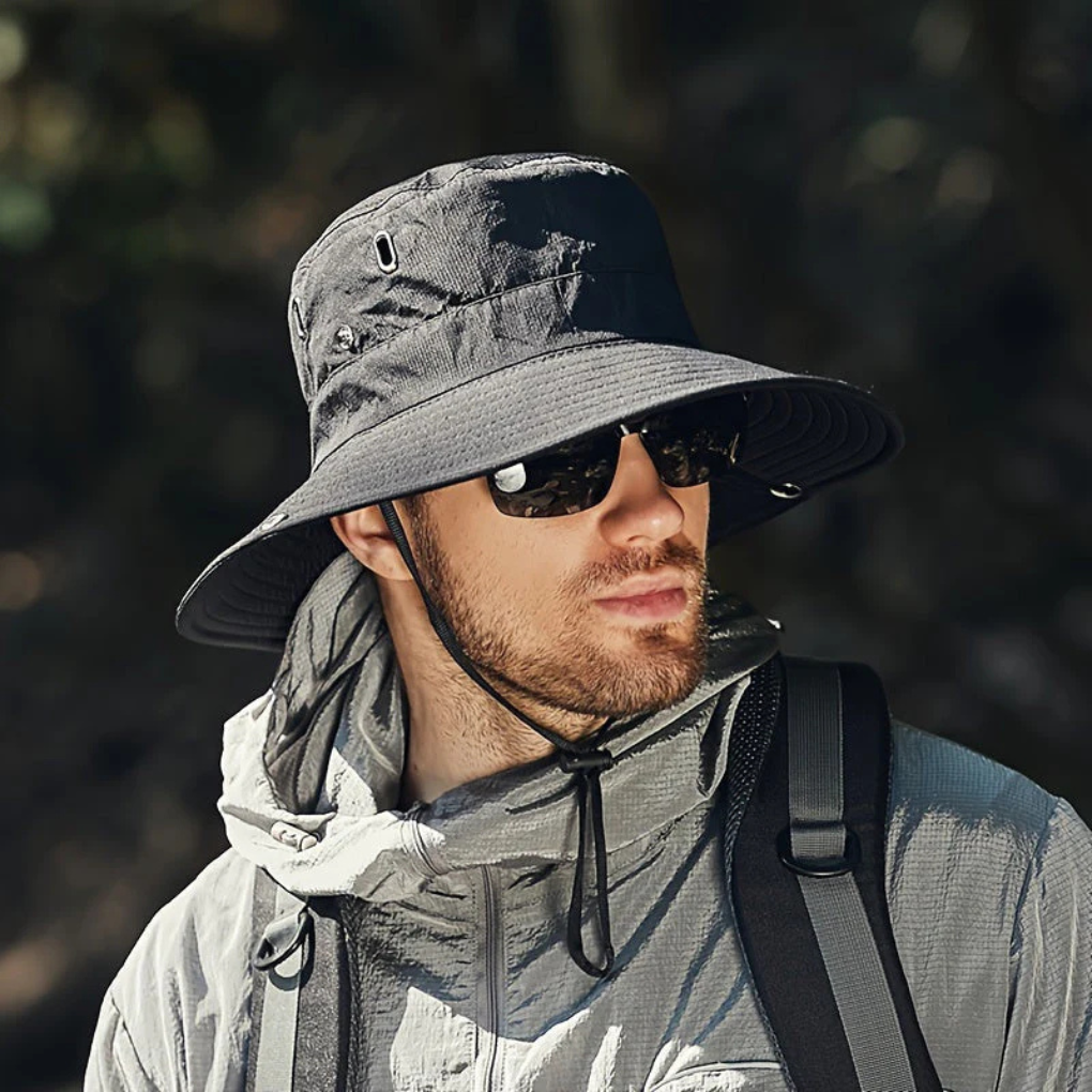 Unisex wide-brim sun hat for superior UV protection, perfect for hiking, beach, and outdoor summer adventures.