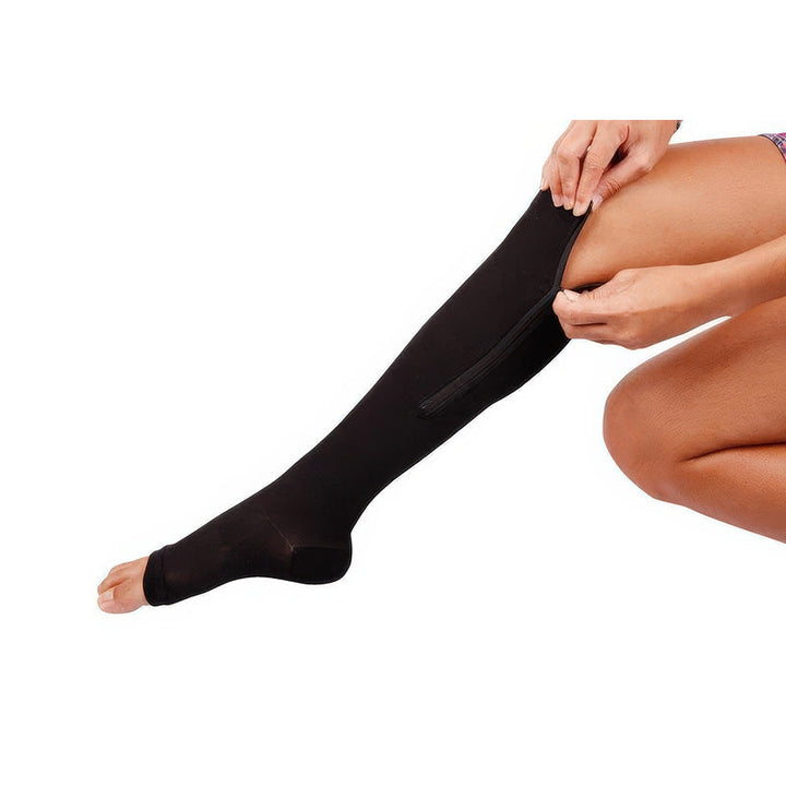 Person wearing open-toe unisex zipper compression socks, offering 20-30 mmHg firm support for daily wear.
