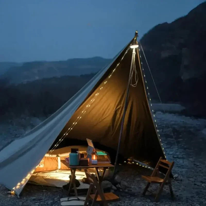 Portable 4-in-1 camping lantern with magnetic base and string lights for outdoor emergencies.