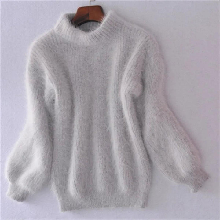 Elegant women's warm high neck knit sweater, ideal for winter, showcasing a soft texture and crewneck style.