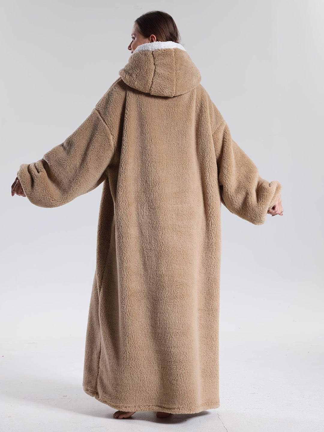 Relax in ultimate comfort with this warm, soft, unisex wearable hoodie blanket.