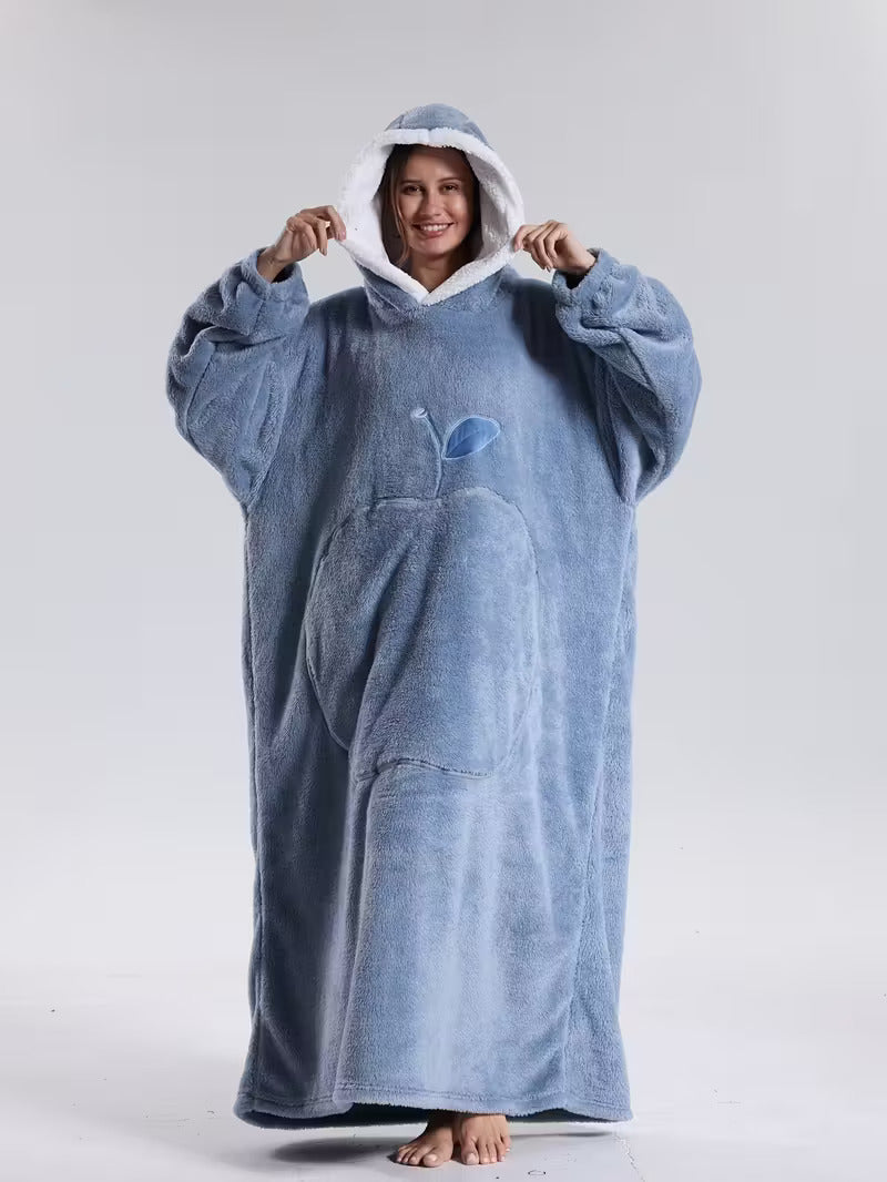 Ultra soft fleece wearable hoodie blanket, offering warm comfort for relaxing winter evenings.