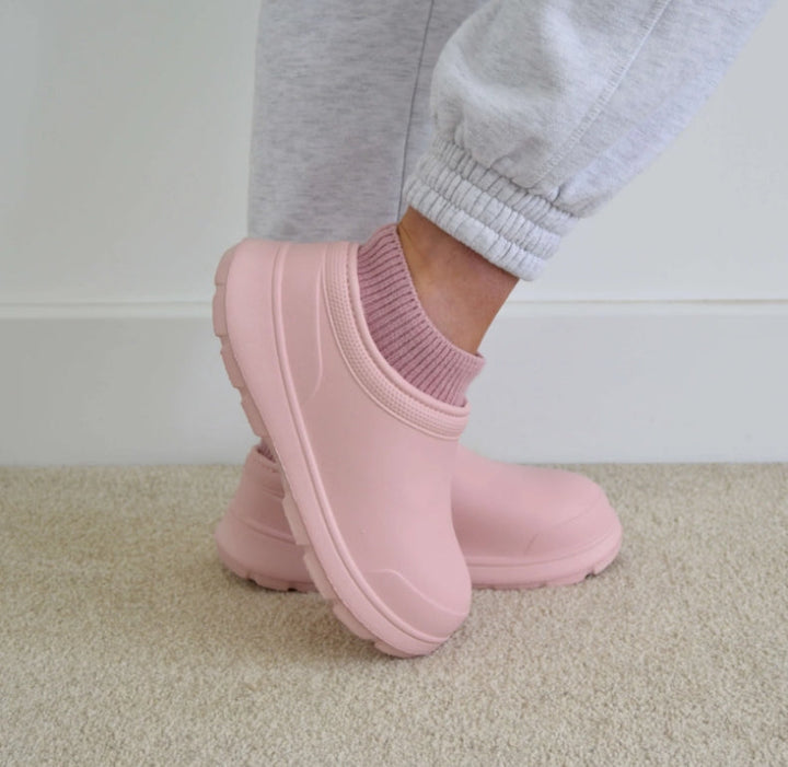 All-season women's slip-on clogs offering superior comfort, cloud cushioning, and weatherproof durability.