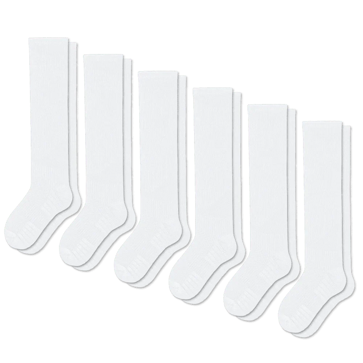 Close-up of a white gentle compression sock, highlighting the comfortable knit for leg support