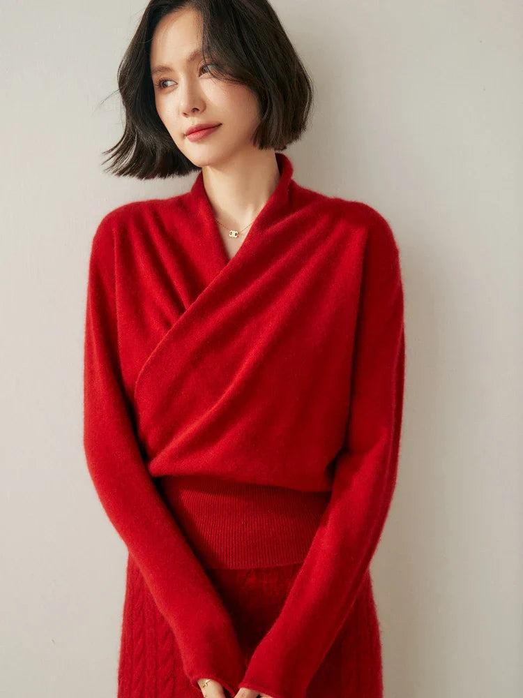 Close-up of a luxurious pink cashmere crossover sweater, soft texture