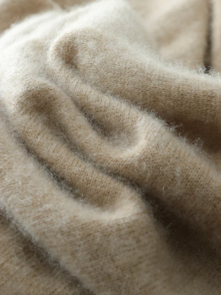 Full shot of a luxurious camel women's cashmere crossover sweater