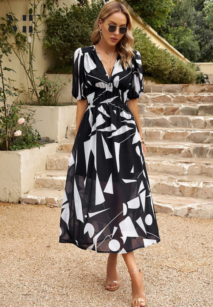 Vibrant abstract print women's midi dress, a must-have for warm seasons.