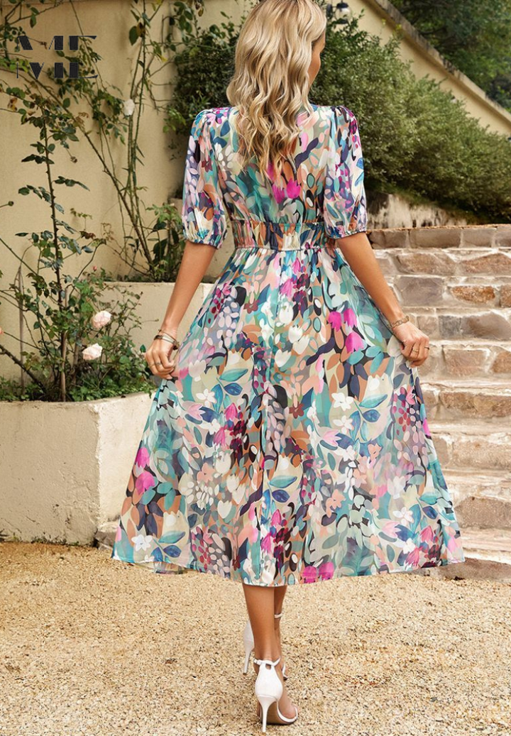 Elegant women's belted midi dress, featuring a unique abstract pattern.