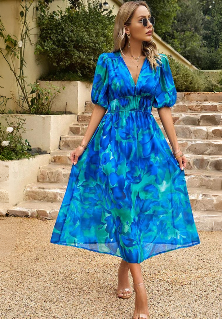 Abstract print midi dress for women, with a flattering belted waist.
