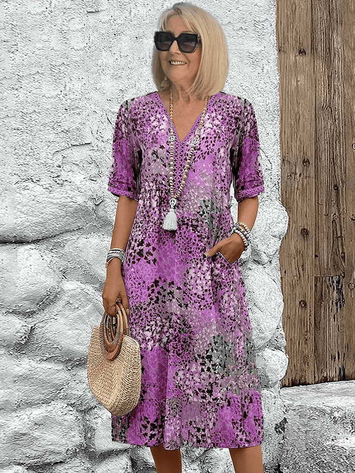 Beautiful Ameline Ocean Breeze women's summer maxi dress, a colorful and flowy beach-ready design.