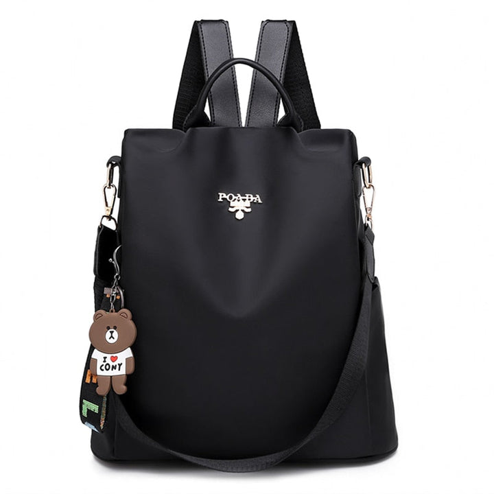 Close-up of durable Oxford fabric on women's anti-theft water-resistant backpack, stylish & functional.