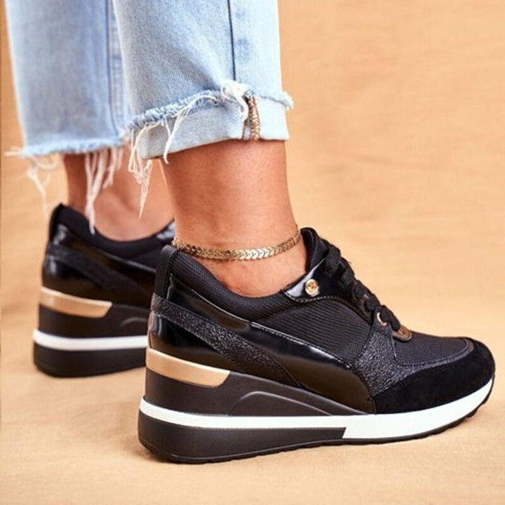 Pair of 'Aurora' women's trendy non-slip athletic sneakers, ideal casual footwear.
