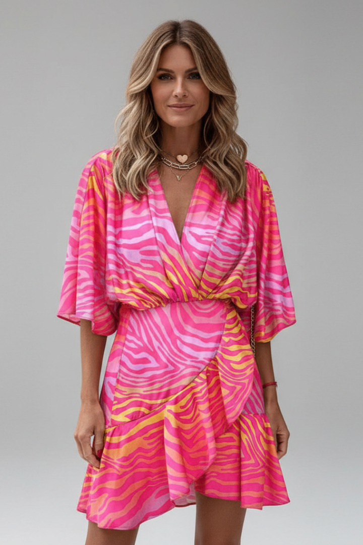 Comfortable women's mini dress, featuring flowy batwing sleeves, V-neck, and adjustable tie waist detail.