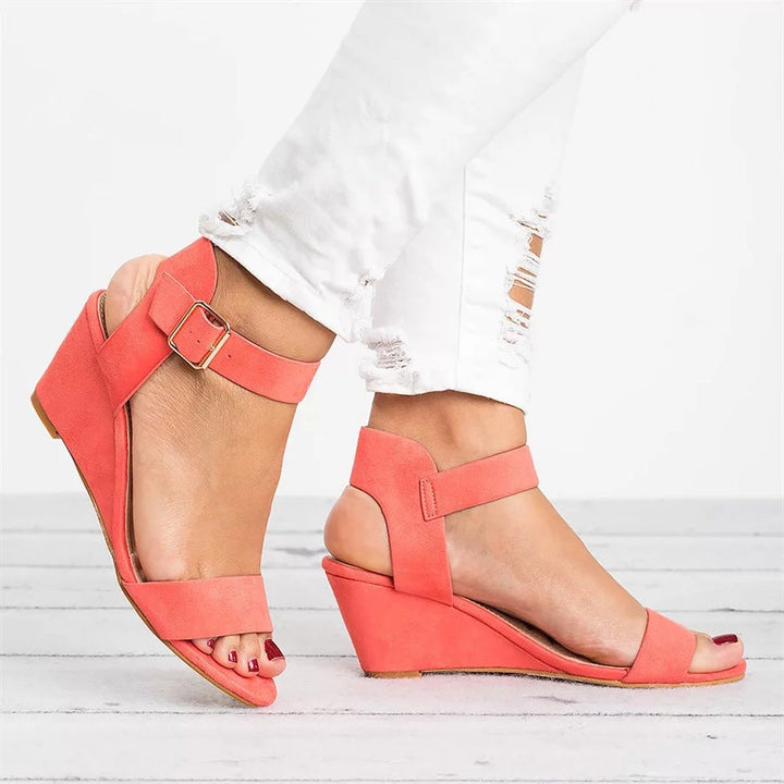 Close-up of a women's spring ankle strap wedge sandal, highlighting the comfortable platform sole