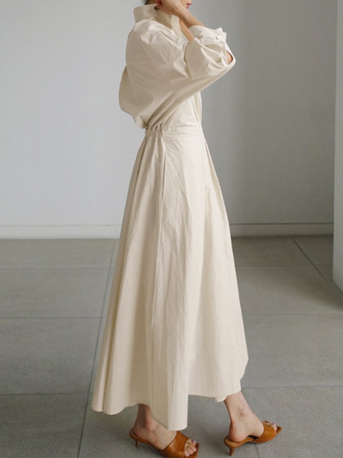 Casual women's maxi dress featuring a full button-front, classic collar, and self-tie belt, ideal for comfort.