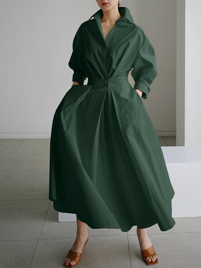 Comfortable long women's dress, designed with a button-front closure and a chic waist-cinching belt.