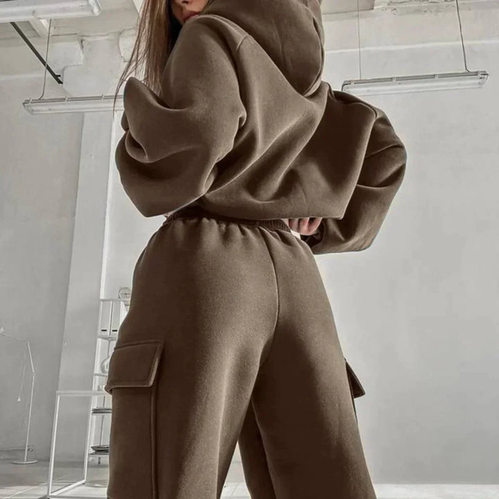 Close-up of women's grey cargo jogger pants with pocket detail, streetwear style