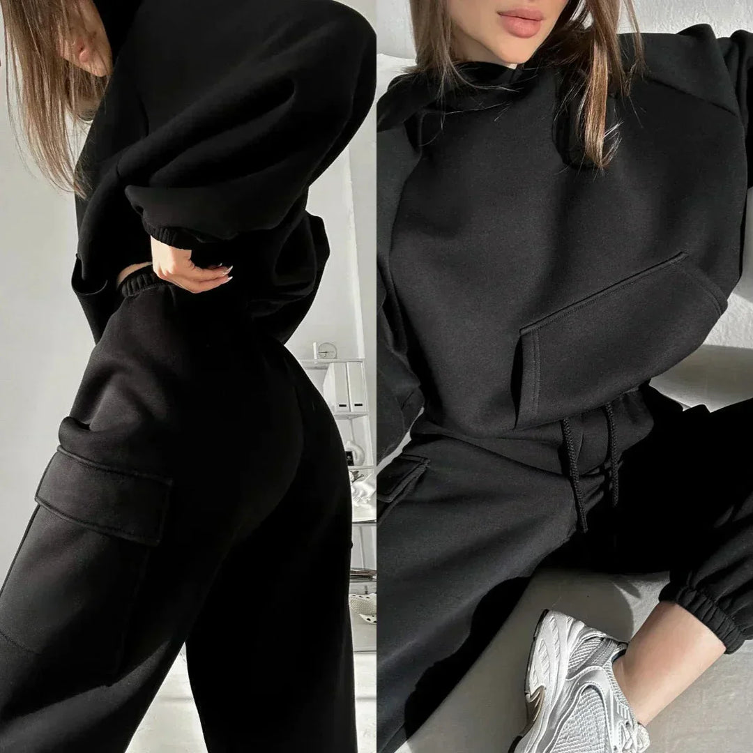 Two piece women's loungewear set featuring a hoodie and cargo joggers, front view