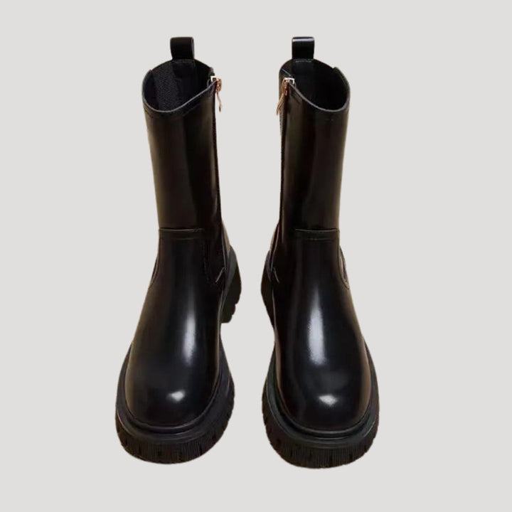 Stylish women's black platform mid-calf boots with a chunky sole for spring