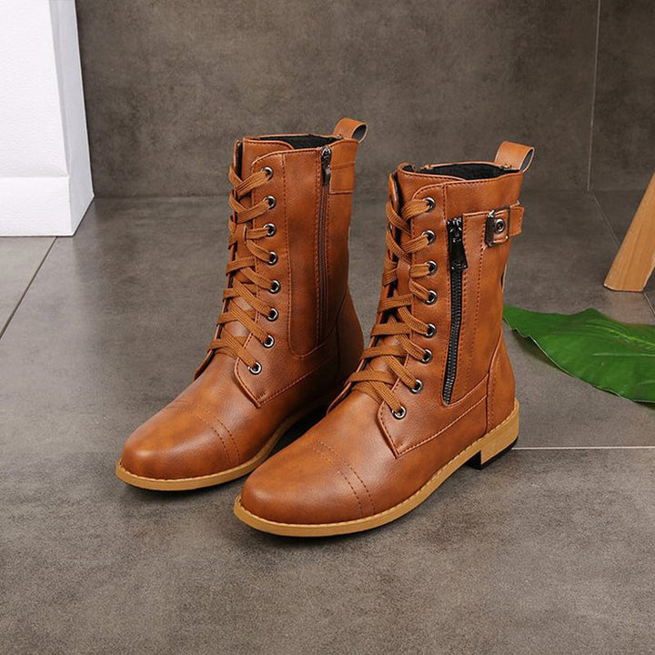Women's combat boots in a fall fashion setting, showcasing their versatility and stylish appeal.