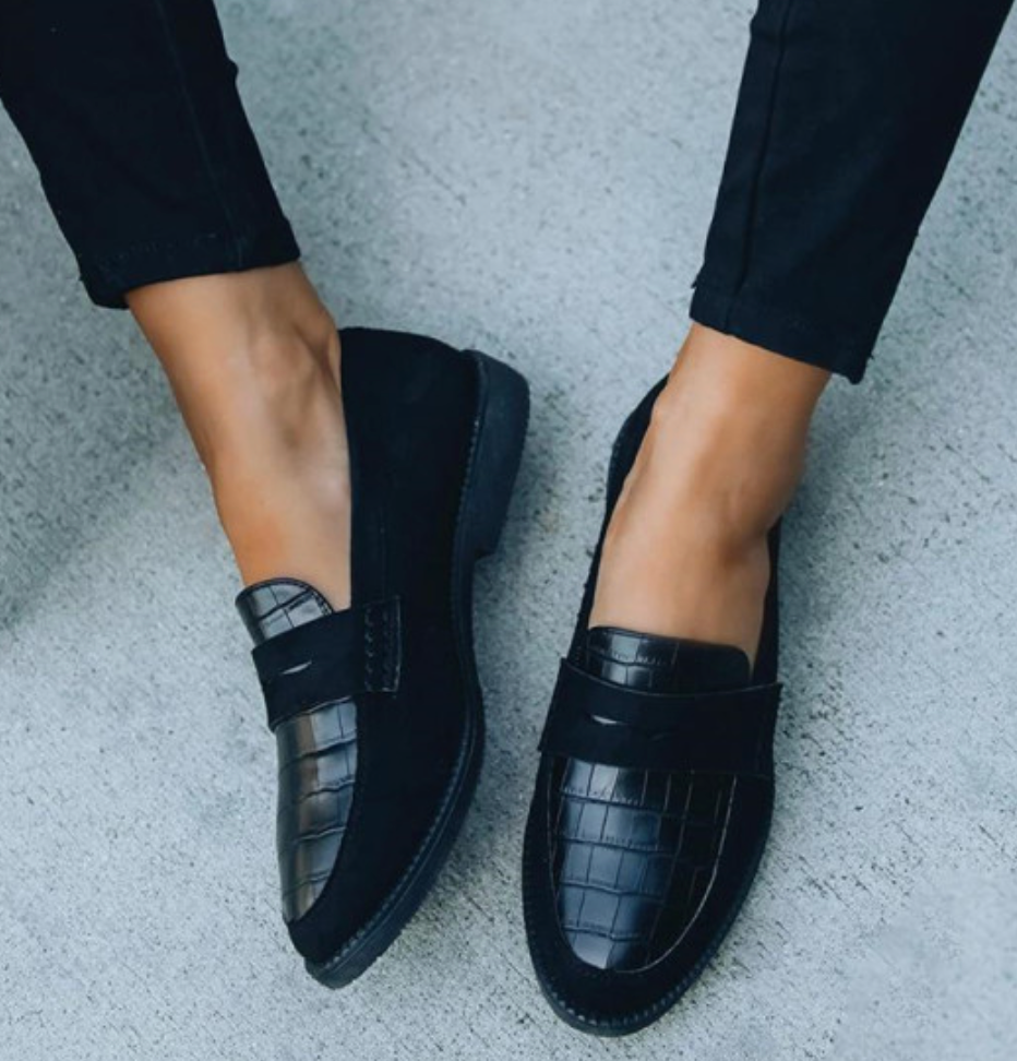 Comfortable women's slip-on loafers with elegant crocodile texture, perfect for any outfit.