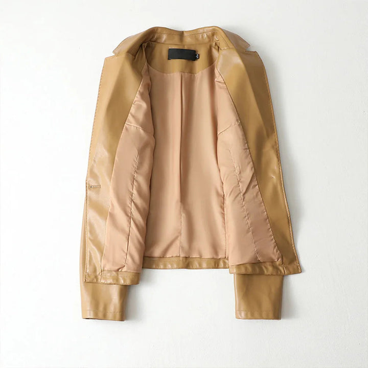 Stylish women's vegan leather jacket in black, featuring a slim fit and sophisticated tailoring.