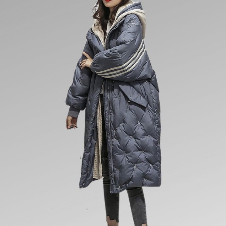 Women's black insulated long padded jacket for ultimate winter warmth and protection from cold weather.
