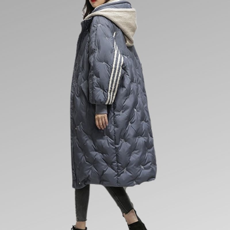Cozy women's navy blue long padded jacket, perfect warm outerwear for cold weather & winter fashion.