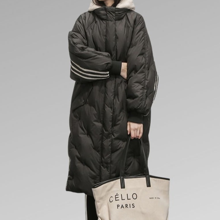Stylish women's insulated long winter coat, a warm padded jacket ideal for everyday cold weather.