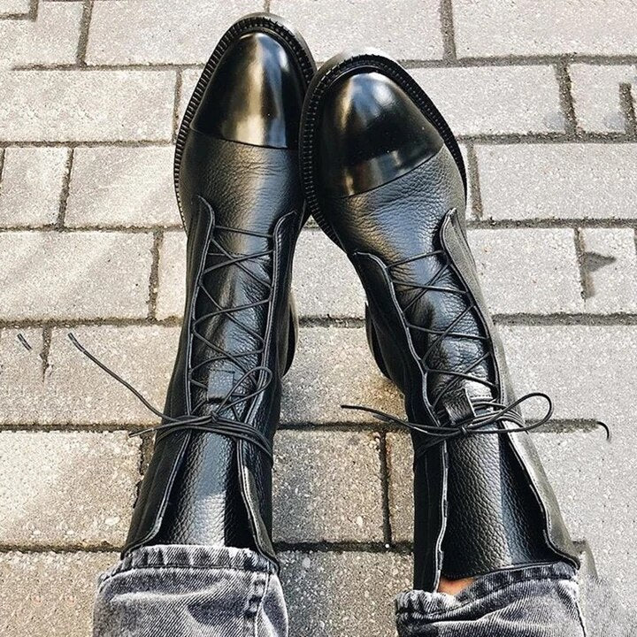 Classic women's durable leather ankle boots, lace-up design for comfortable everyday wear.